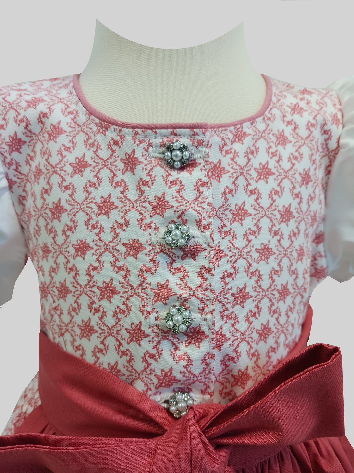 "LAILA" Babydirndl Kinderdirndl mit Edelweiß Koralle weiß 74/80